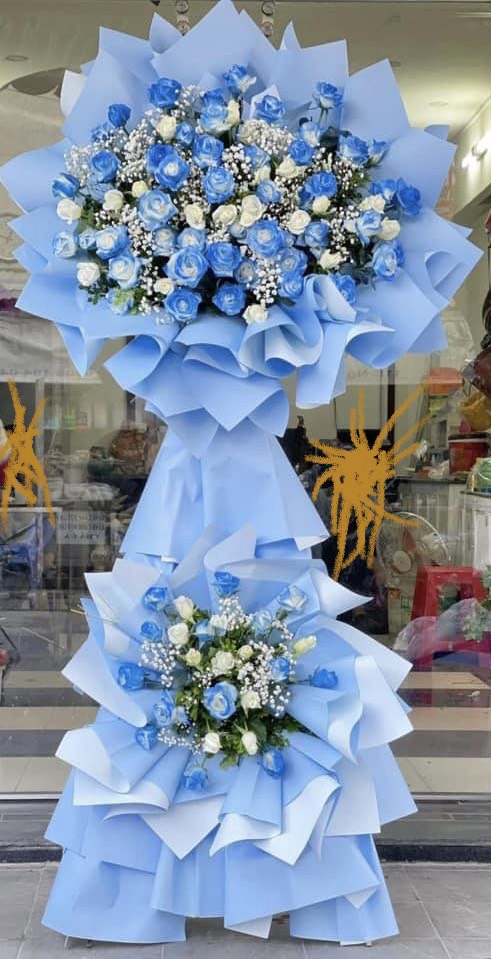 Kệ hoa khai trương tone xanh dương 