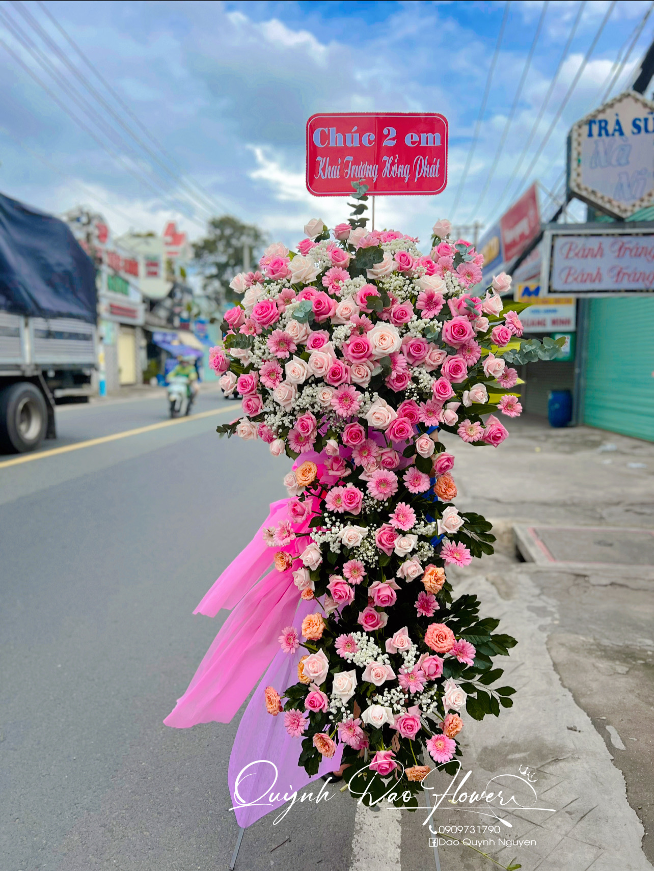 Kệ khai trương tone Hồng mix hoa đồng tiền 