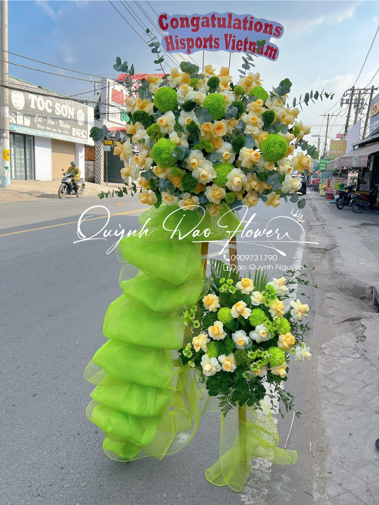 Kệ hoa chúc mừng  vàng xanh