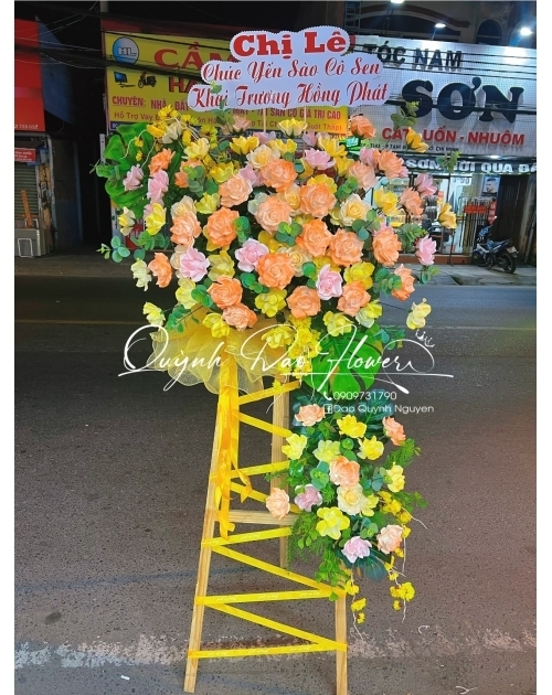 Kệ khai trương hoa sáp tone cam 