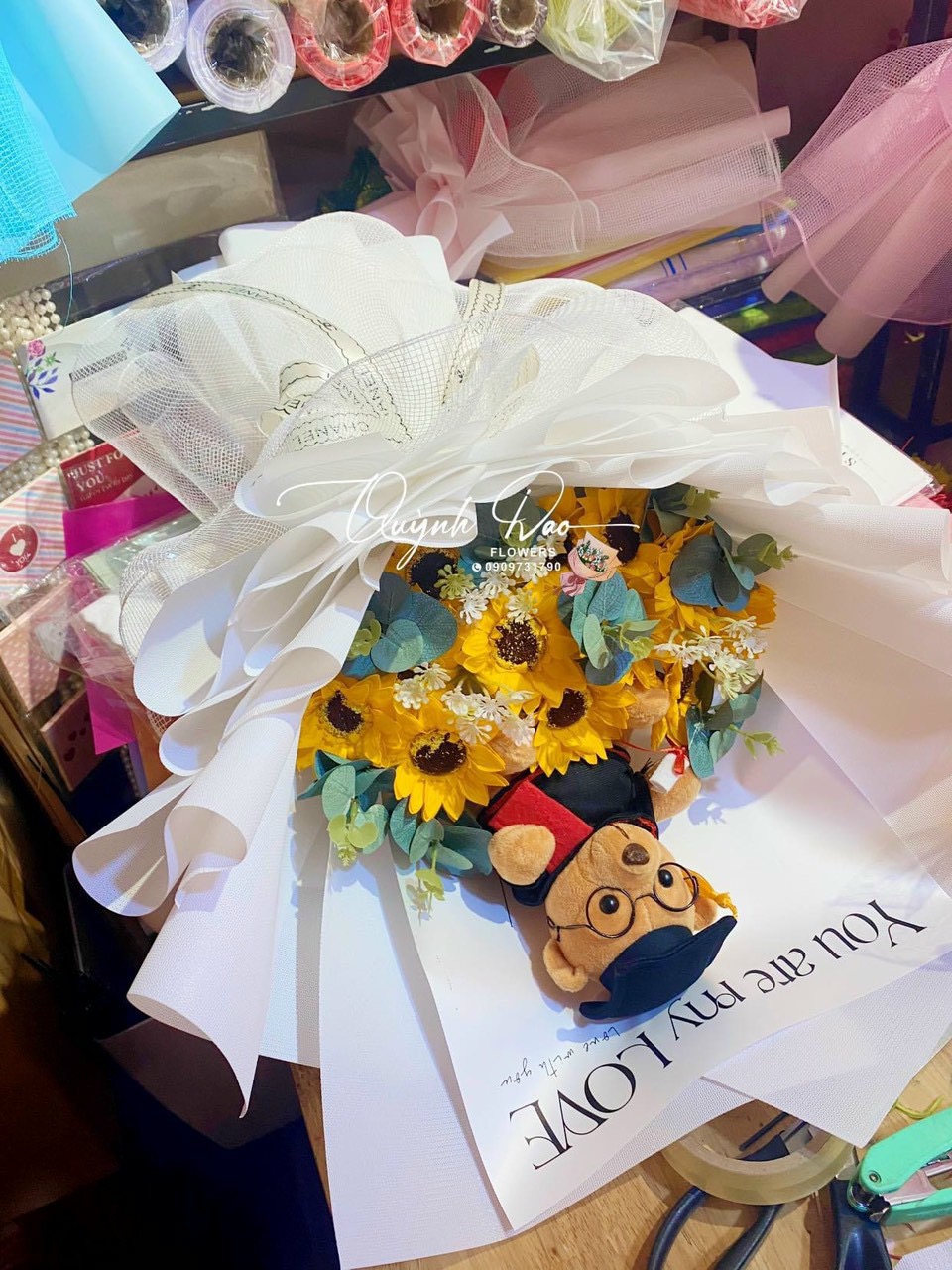 Bó hoa hướng dương kèm gấu 