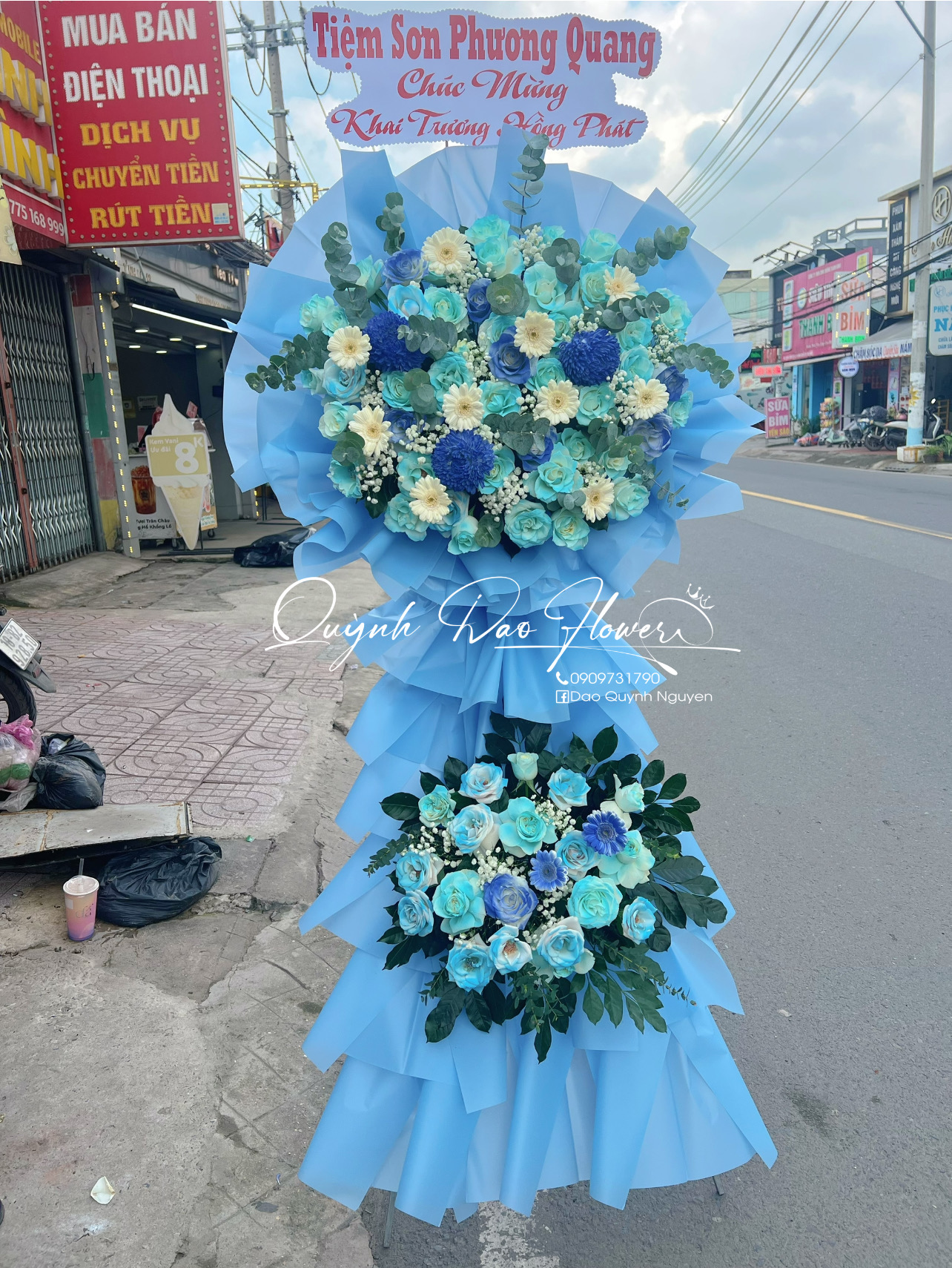 Kệ hoa chúc mừng xanh dương thuận an