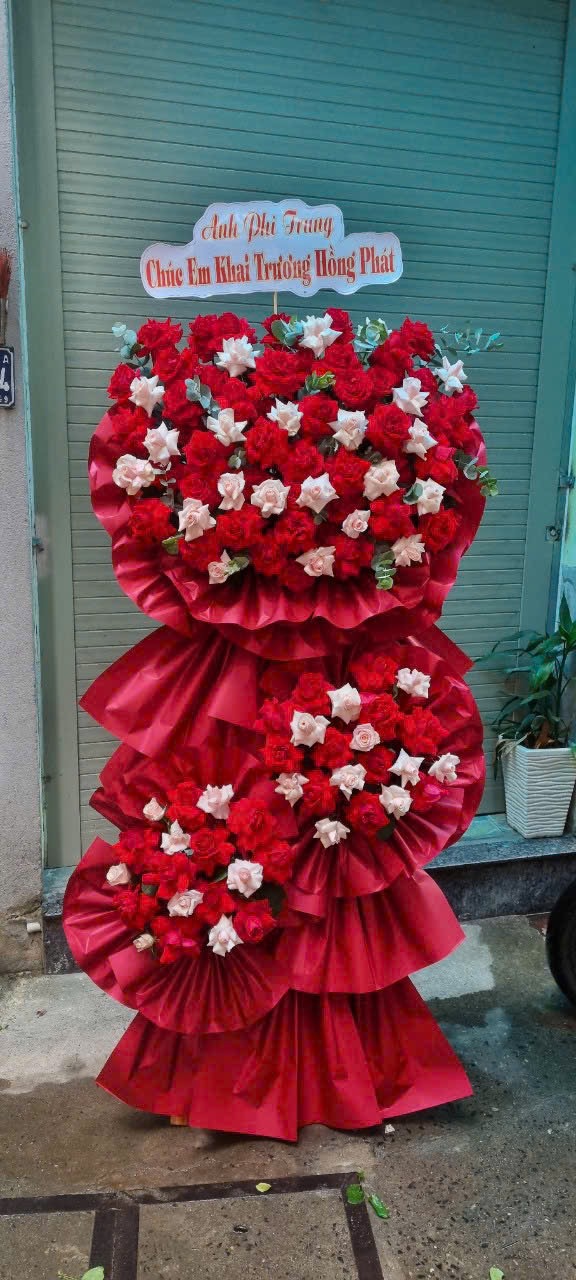 Kệ khai trương tone đỏ to đẹp  o dĩ an