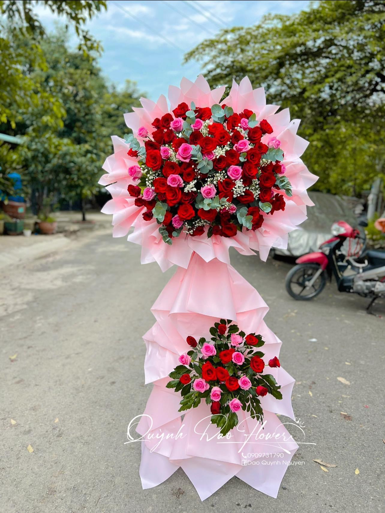 Kệ khai trương tone Hồng to đẹp 