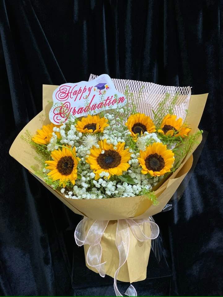 Bó hoa hướng dương 7 bông kèm baby