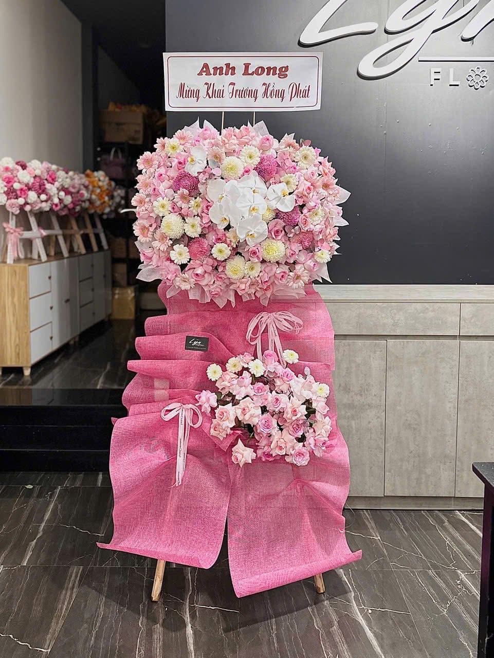 Kệ khai truong tone hồng hiện đại 