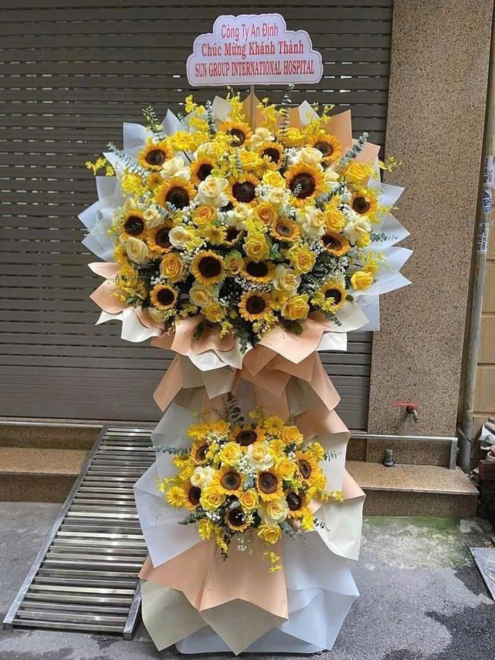 Kệ hoa hướng dương mix lan vũ nữ
