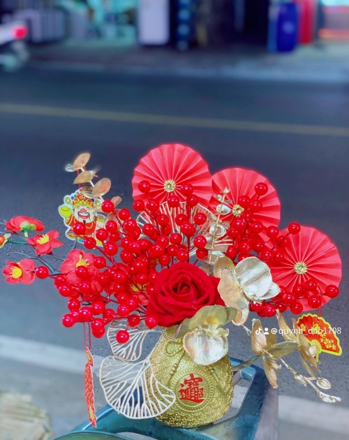 Bình túi tiền đào đông để bàn