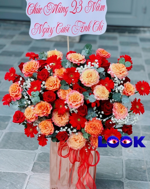 Giỏ hoa khai trương tone cam