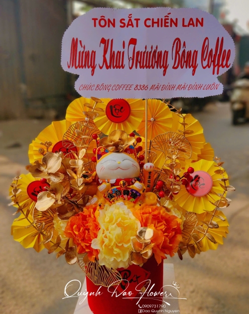 Mèo thần tài khai trương mệnh thổ