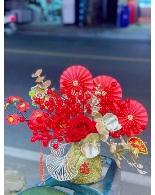 Bình túi tiền đào đông để bàn
