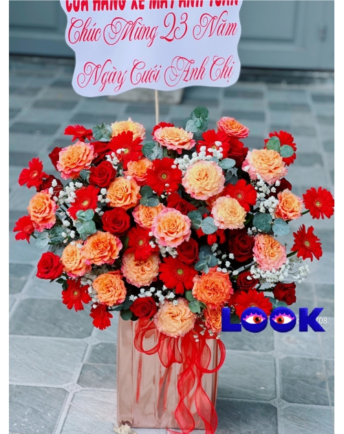 Giỏ hoa khai trương tone cam