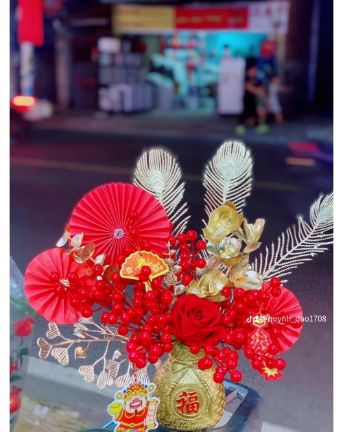 Bình túi tiền đào đông để bàn