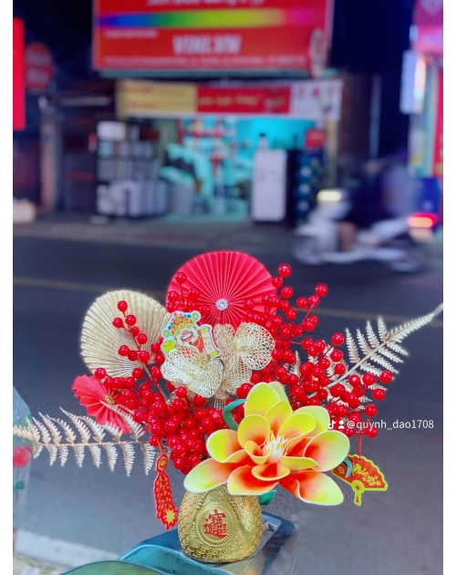 Bình túi tiền đào đông để bàn