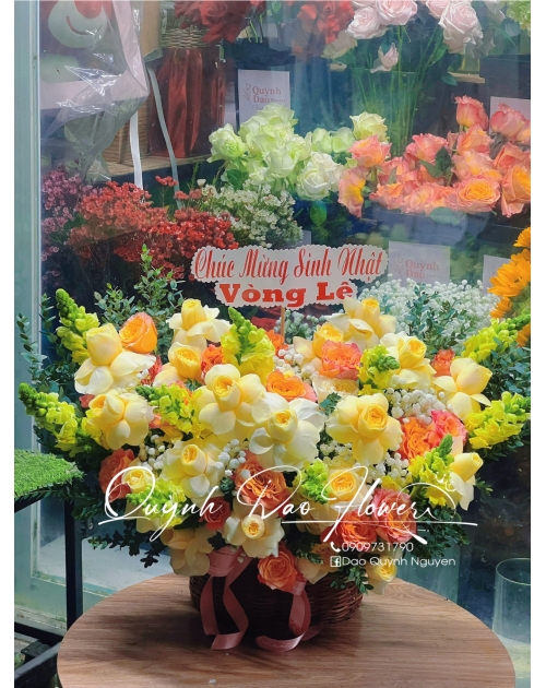 Giỏ hoa vàng camprit thuận an 