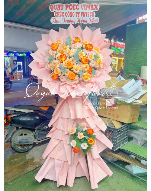 Kệ khai trương tone vàng cam thủ Đức 