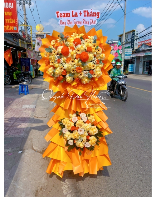 Kệ khai trương cam vàng to đẹp 