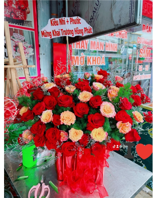 Giỏ hoa khai trương tone đỏ cam rẻ đẹp 