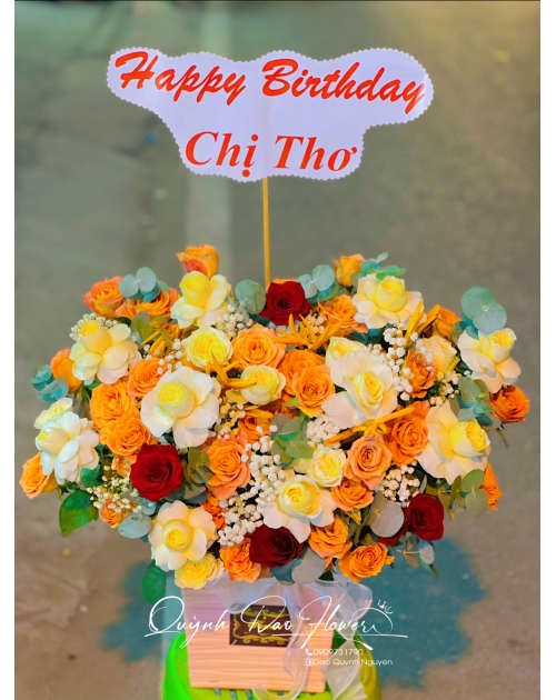 Giỏ hoa tặng sinh nhật tone cam
