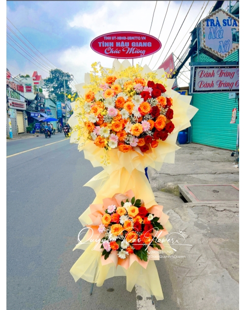 Kệ khai trương tone cam vàng 