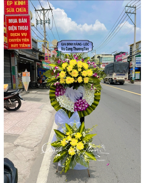 Kệ viếng lan mix cúc vàng 