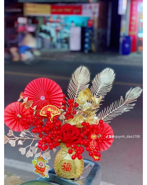 Bình túi tiền đào đông để bàn