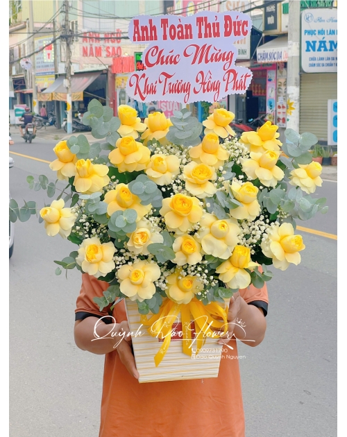 Giỏ hoa chúc mừng khai trương màu vàng 
