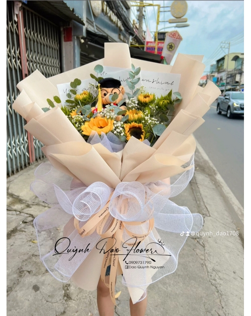 Bó hoa hướng dương kèm gấu tốt nghiệp 