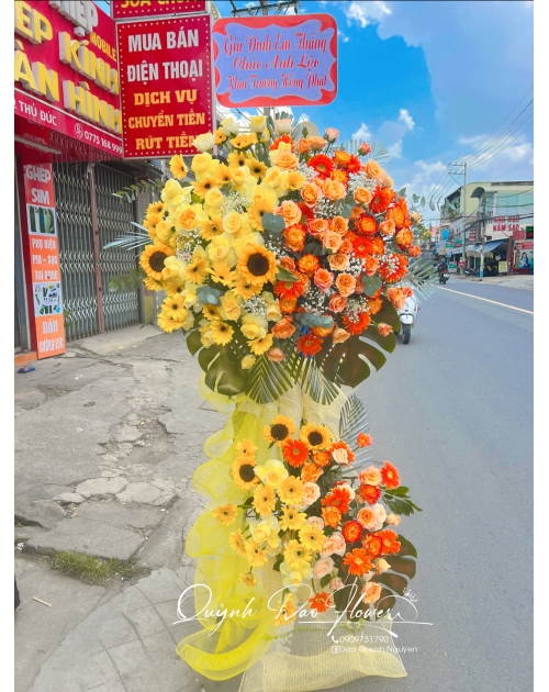 Kệ khai trương tone vàng cam