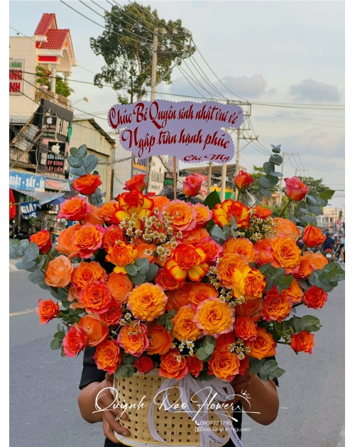 Giỏ hoa khai trương màu cam tại bình Phước 