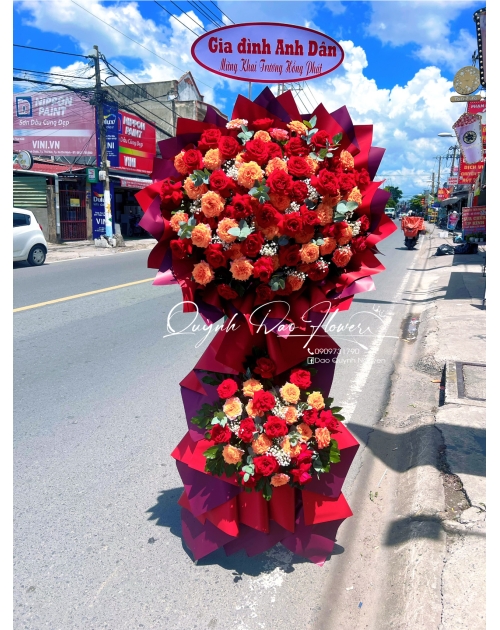 Kệ hoa khai trương tone cam quận 12