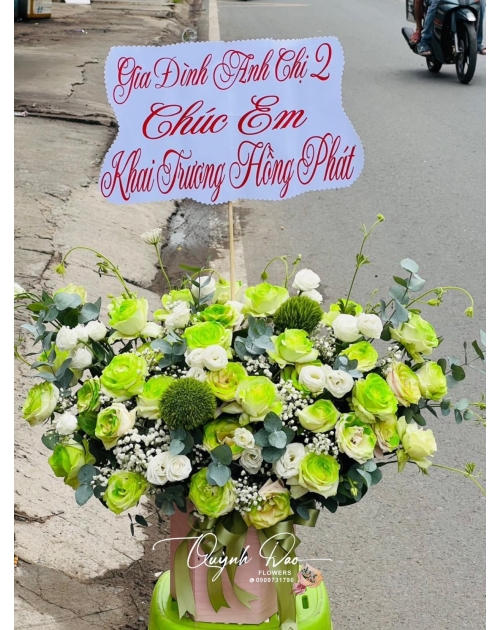 Giỏ hoa khai trương tone xanh lá